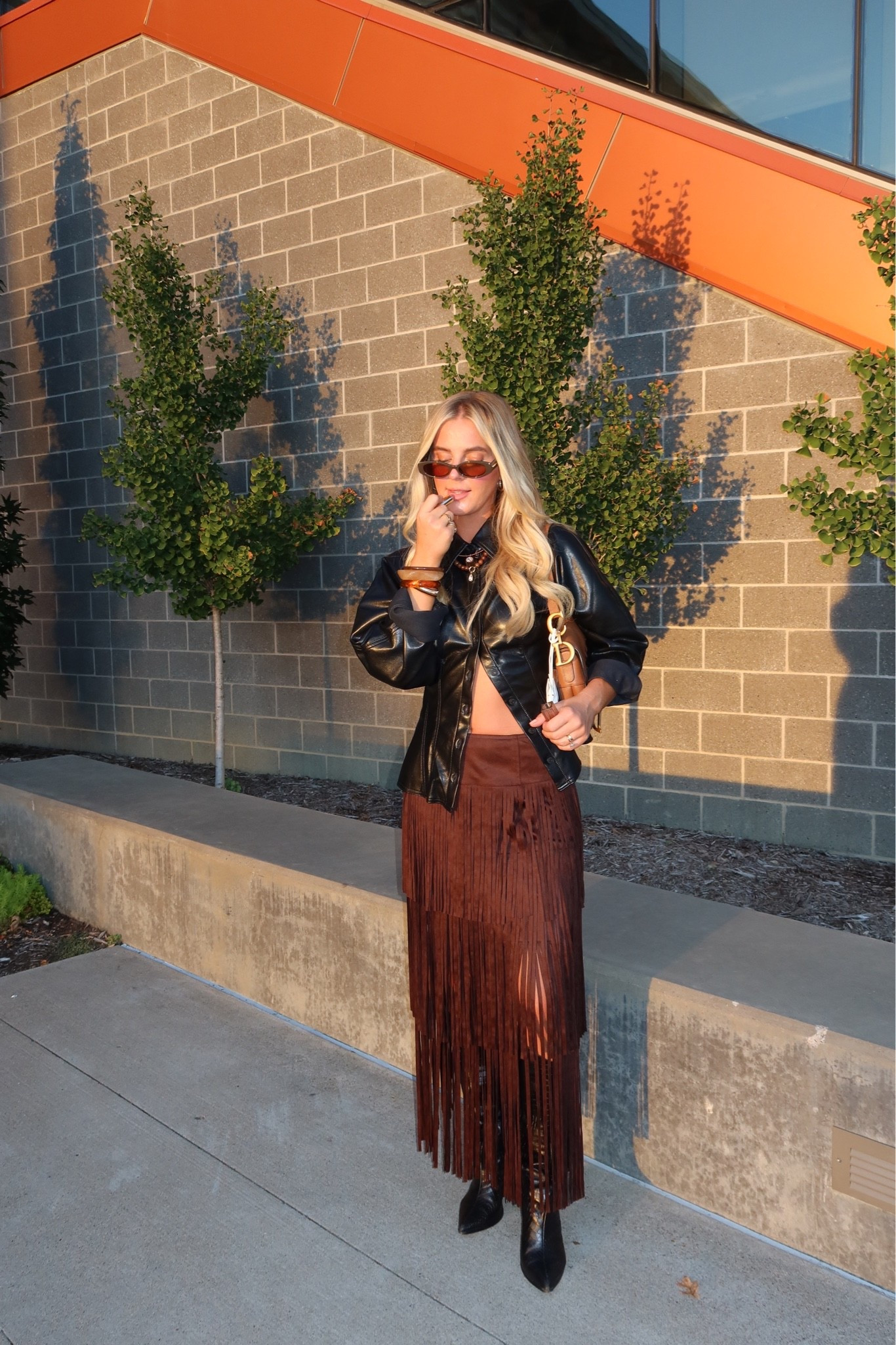 Black and brown are actually cool. @dillards @Schutz

#LTKootd #LTKSeasonal