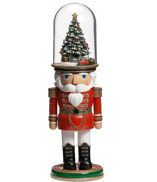 2-ft. Lighted Musical Nutcracker with Rotating Train Figurine | Dillard's