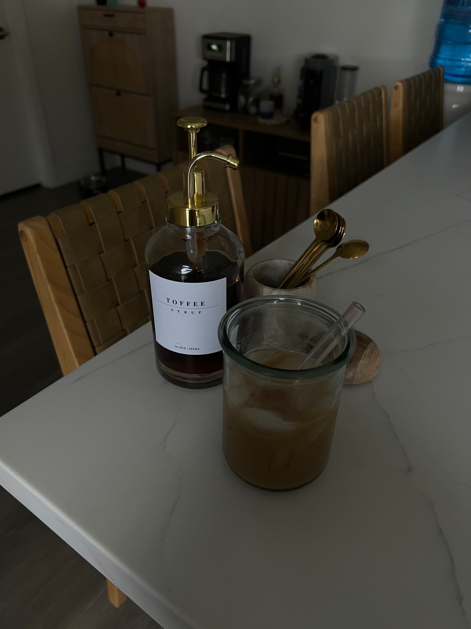 At home Coffee bar essentials 🤎🤍 I’ve saved so much money by learning how to make my coffee shop style iced lattes at home 

I love buying different flavored syrups and putting them in these cute gold coffee dispensers. Little things to romanticize the everyday tasks in my favorite 

These glass coffee syrup dispensers match the organic modern decor style of my house perfectly 

#LTKFindsUnder50 #LTKStyleTip #LTKHome