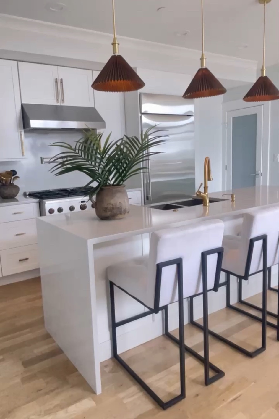 I bought shades for my kitchen pendants and spray painted them in a nutmeg color. 

#LTKunder100 #LTKhome