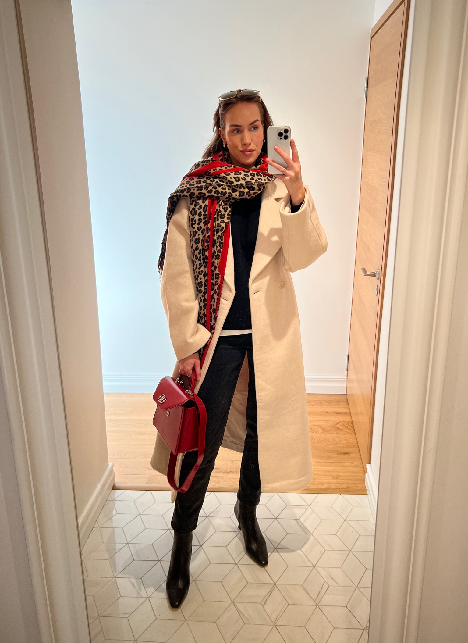 Winter outfit inspo white oversized wool coat, black jeans, ankle boots, cheetah print scarf, red bag

#LTKworkwear #LTKstyletip #LTKSeasonal
