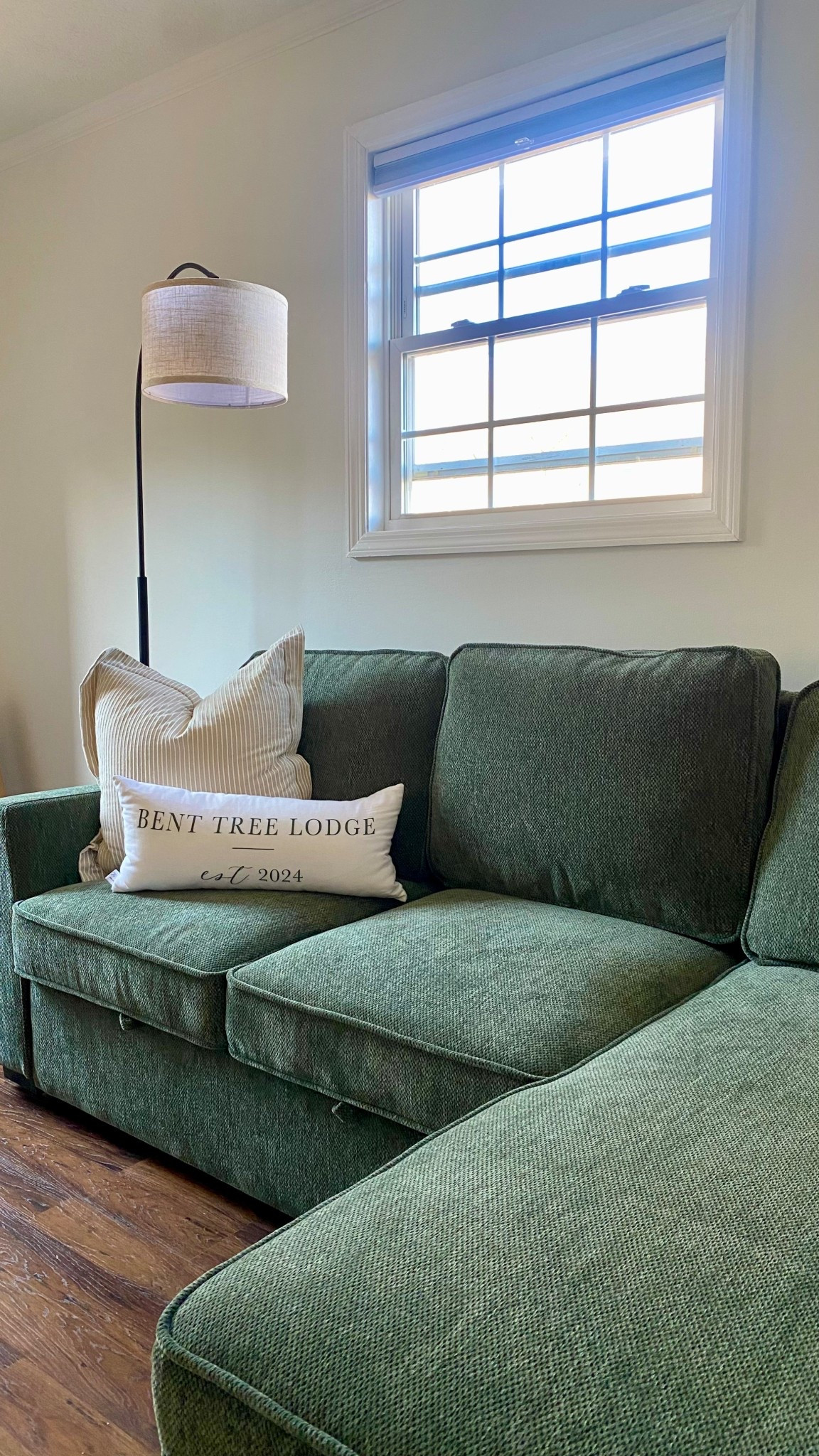 Under $50 floor lamp and storage/sleeper sectional in the primary at Bent  Tree Lodgee

#LTKHome