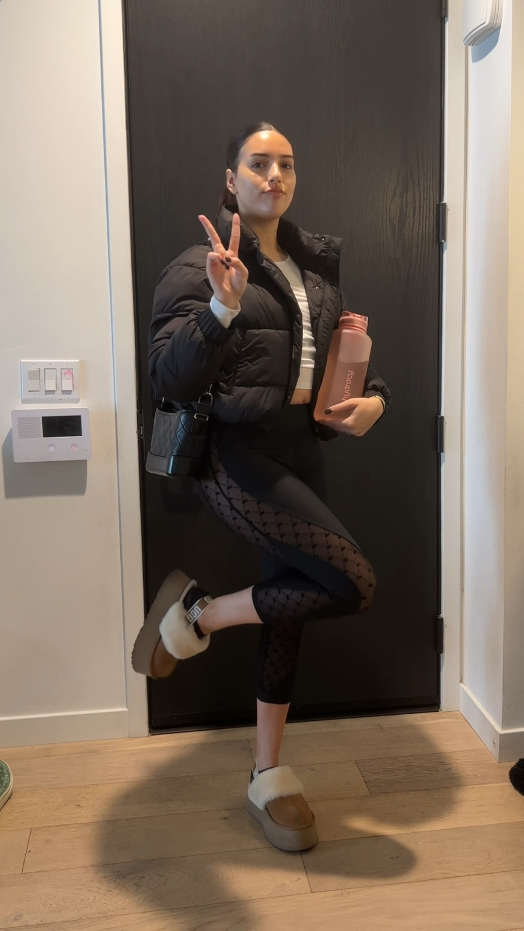 Bra, Top, Leggings all by Alo Yoga, puffer Zara, Shoes Uggs, Bag Chanel  