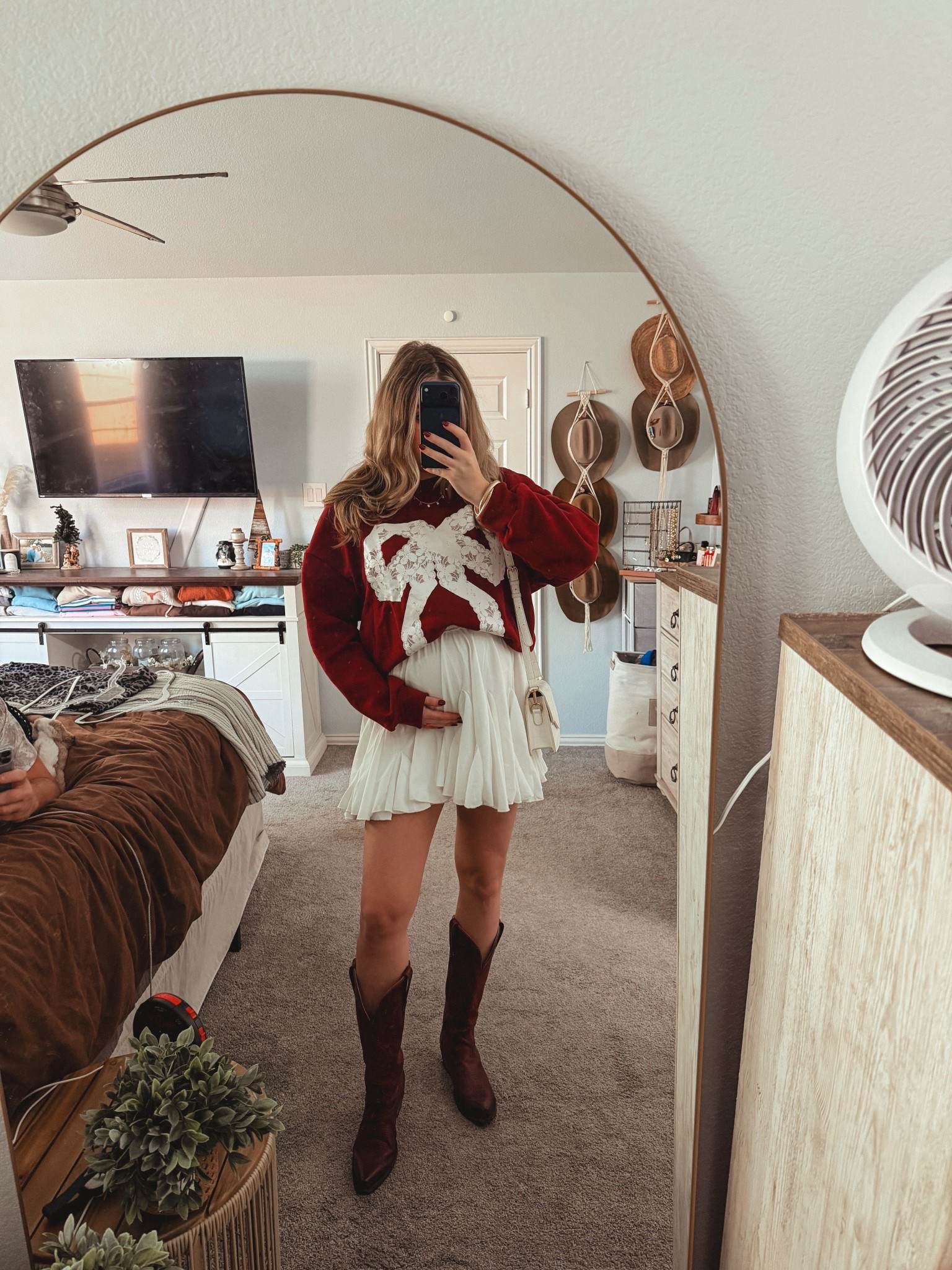 Cute holiday outfit. Lace bow and burgundy boots. Cowboy boots. Skirt and sweatshirt outfit. Maternity ootd. Pregnancy outfit  

#LTKmomlife #LTKootd #LTKHoliday