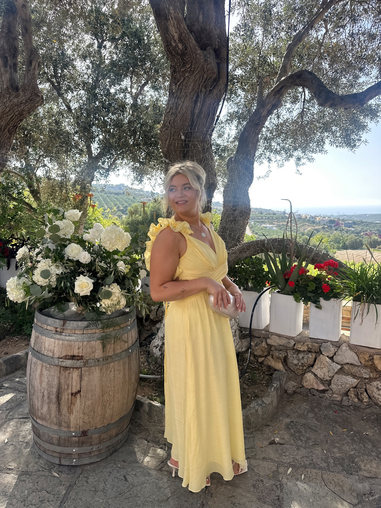 Midsize wedding guest dress in Greece! Originally from little JC boutique but I’ve linked similar! Summer wedding abroad 💛☀️ 

#LTKeurope #LTKsummer #LTKmidsize
