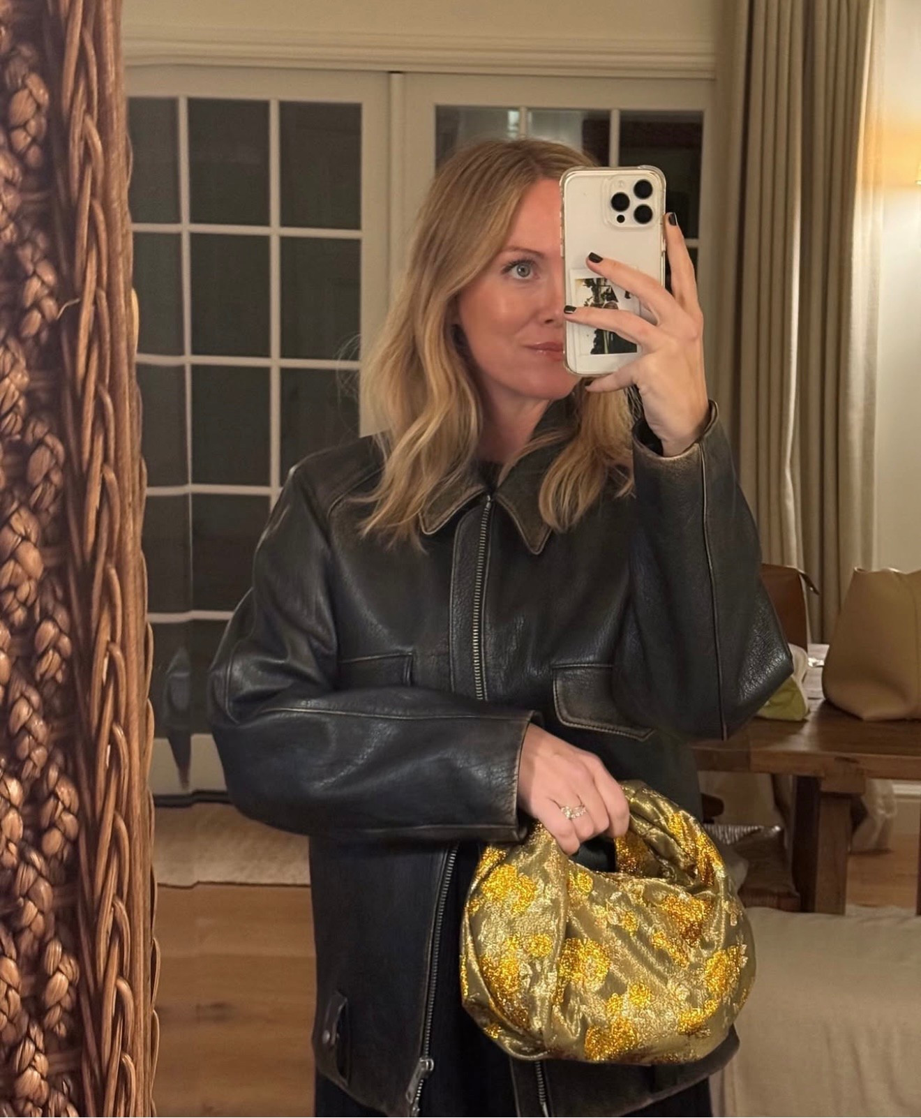 Found a similar and very chic leather jacket that resembles my Prada jacket - had to share 🤎