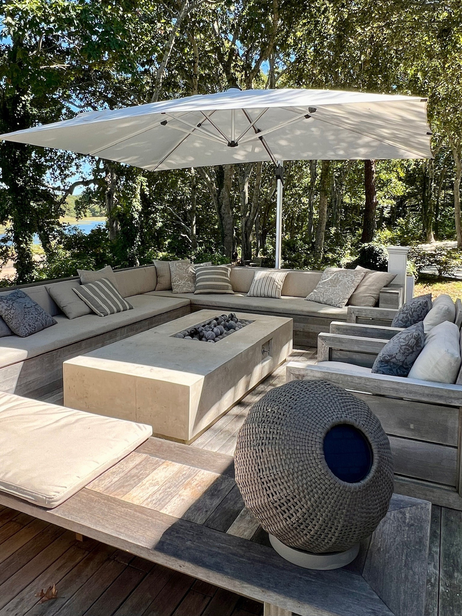 This commercial grade umbrella can sustain the wind and strong summer storms that are common during these months. I used the Cane-line umbrella at a client's home and we were instantly sold. It's certainly worth the investment and instantly offers a more practical and comfy place to rest during hot days. I'm also linking some outdoor throw pillows and outdoor rugs that will offer your patio or porch a nice touch! 

#LTKHome #LTKFindsUnder100 #LTKSummerEdit