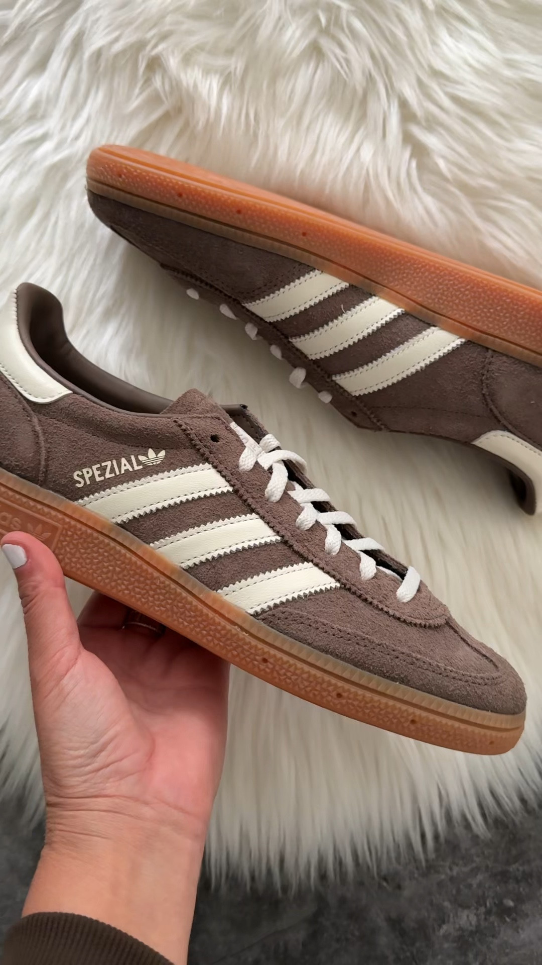 Adidas sneakers run large. Go down a size for the best fit 