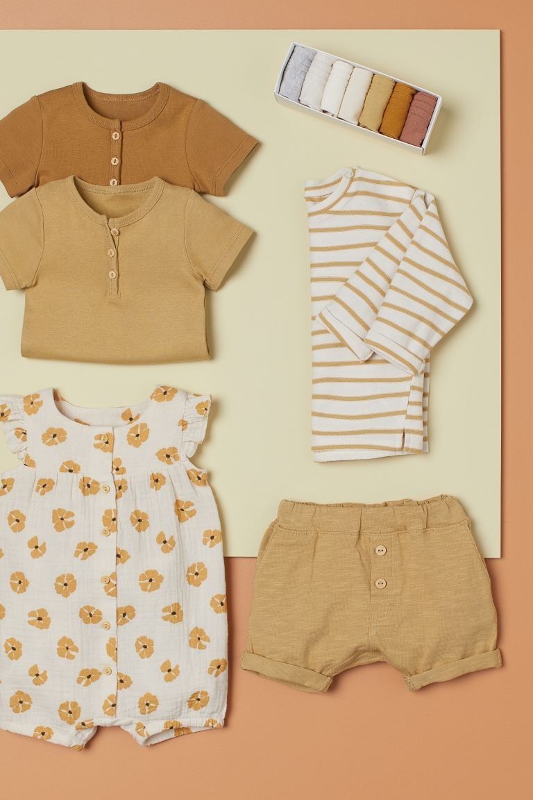 Conscious Baby Exclusive
	Baby Exclusive. Short-sleeved bodysuits in soft, organic cotton jersey.... | H&M (US + CA)