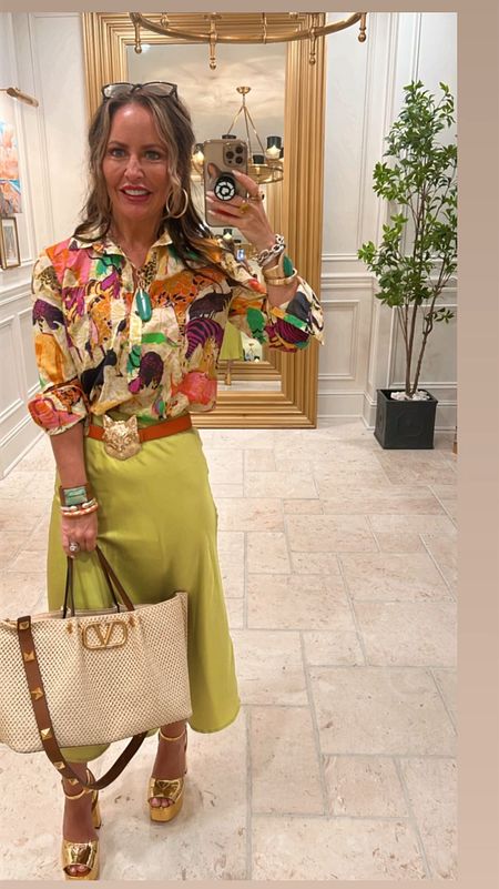 Sunday safari! 🐘🐅🦓 My blouse and skirt are old, but I linked similar options, along with my exact handbag and heels. #ootd #lookoftheday #colorpop #sundayfit #satinskirts #summerbag #wovenbag #platformheel #metallic #momlooks #looksover30 

#LTKShoeCrush #LTKBeauty #LTKStyleTip