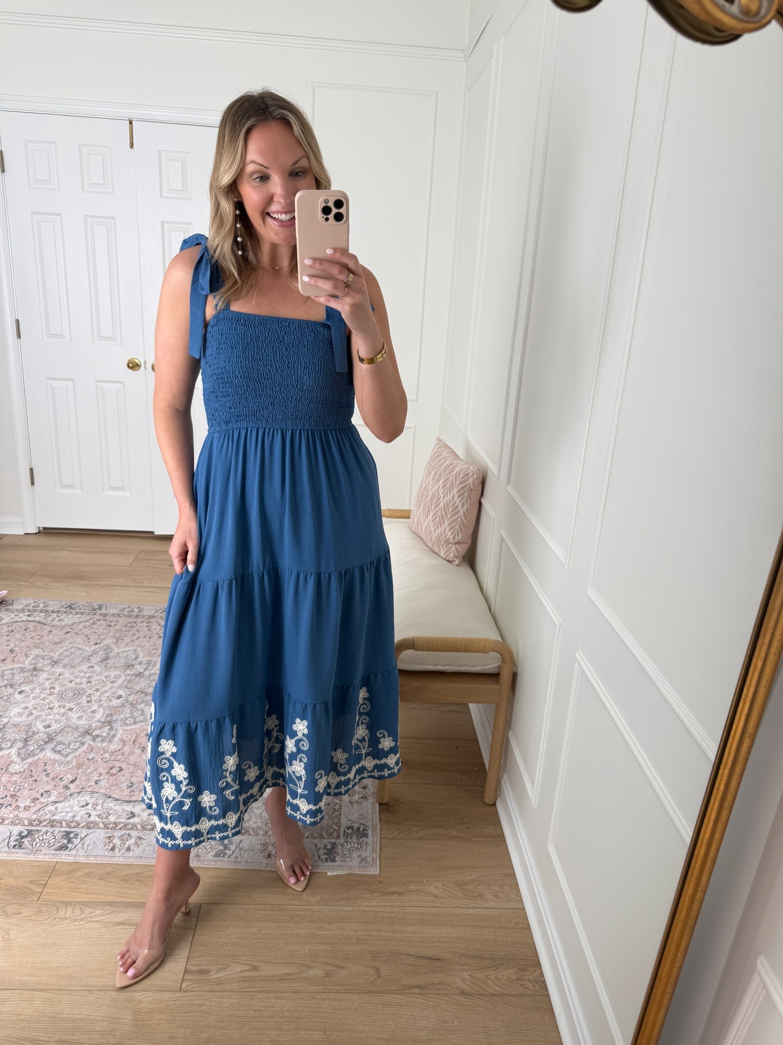 Smocked and stretchy top with tie straps! Wearing a med 