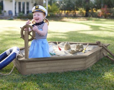 Wood Sandbox from Potterybarn! 

Put them at the helm of creative adventure with our nautical backyard sandbox. It’s built to last with a hand-finished, kiln-dried wood hull and a wheel that turns—simply fill it with sand and let them navigate wherever their imaginations take them.
DETAILS THAT MATTER
Expertly crafted from sustainable plantation grown FSC MIX swietenia macrophylla and eucalyptus grandis.
Boat wheel spins 360°.
Bottom of sandbox features a gray outdoor liner made of ateja.
Passes flammability testing.
Features a water-based Weathered Gray finish.
Made with FSC®-certified wood. Your purchase helps support healthy forests and ecosystems worldwide.
Sand is not included. 
KEY PRODUCT POINTS
Pottery Barn Kids exclusive.
Water, stain and fade resistant.
Some assembly required.
Imported.



#LTKSeasonal #LTKkids #LTKfamily