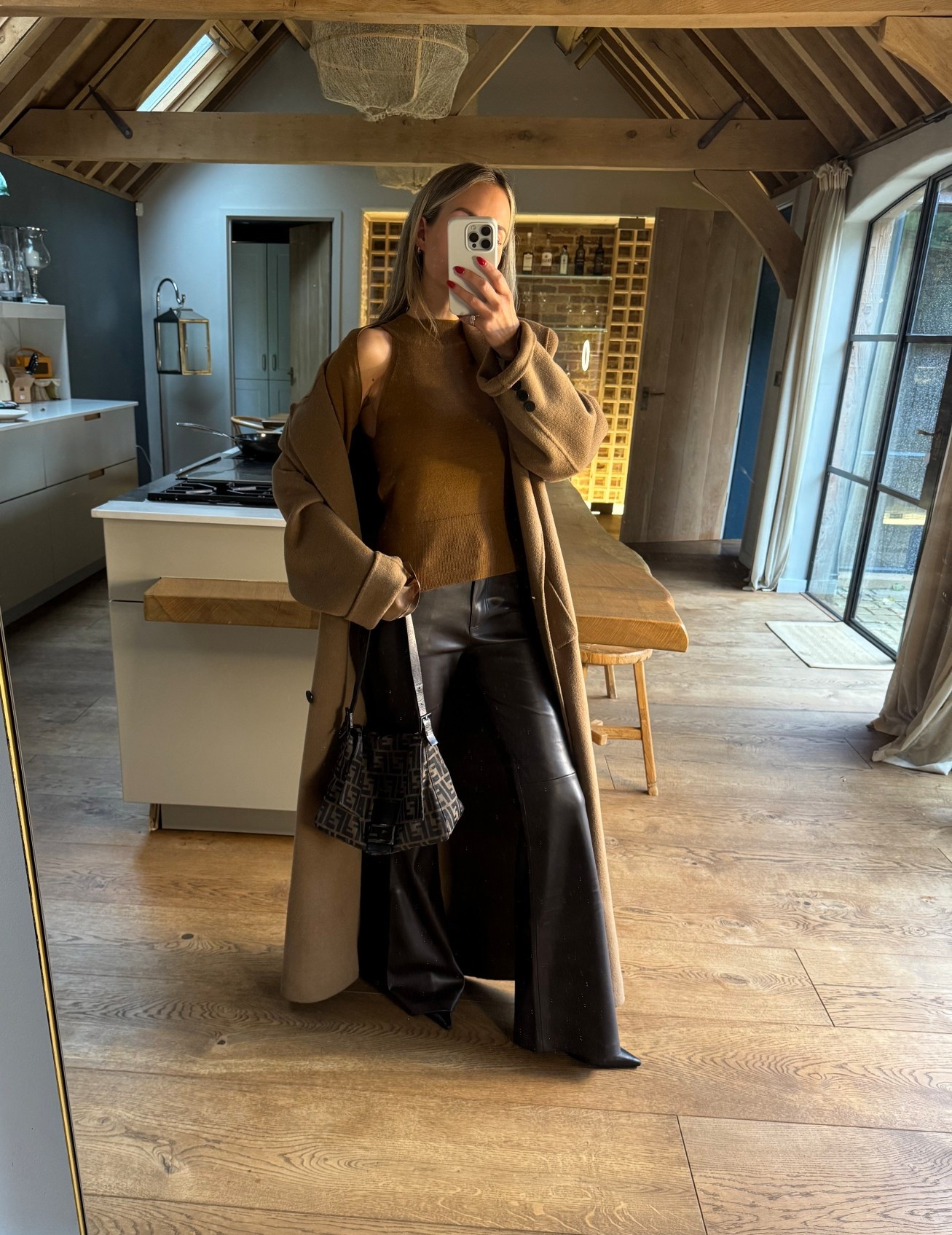 Full Autumn mode with a brown knitted sweater and faux leather trousers ready to dash out in the rain. I took a size S in the top, UK4 in the trousers and an XS in the coat. Ready to dash off for a Sunday roast 🤎

#LTKdatenight #LTKautumn #LTKuk