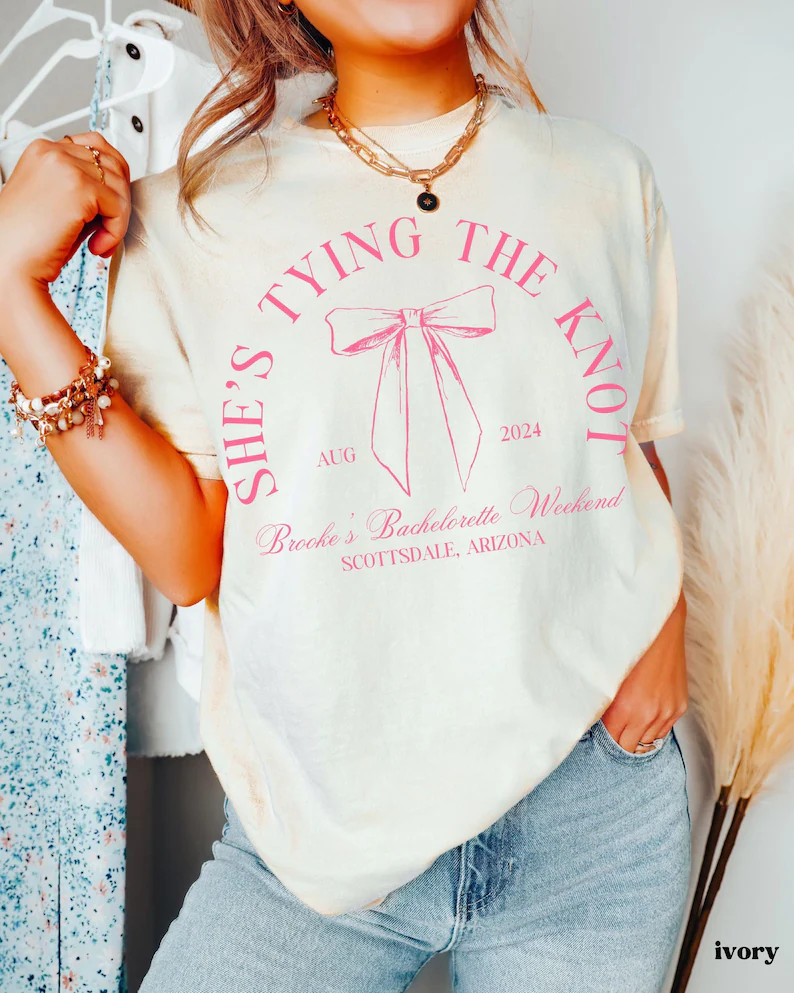 She's Tying the Knot Bachelorette Shirts, Custom Location Coquette Bow Them Bach, Bridal Party Fa... | Etsy (US)