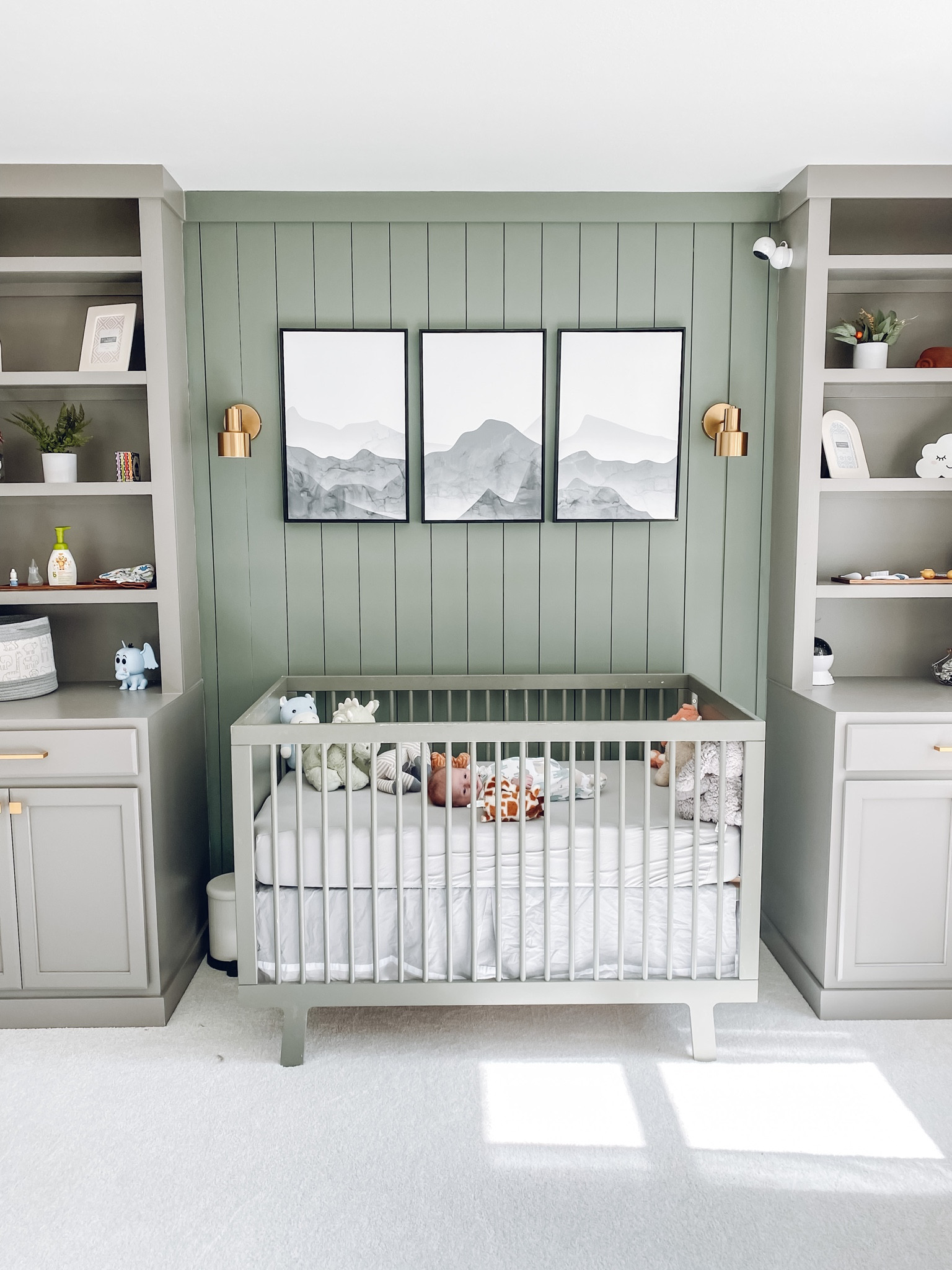 Baby boys nursery! I love this project so much. Custom built in cabinets and shelves and a shiplap accent wall. Shop the details here! 

#LTKhome #LTKbaby #LTKfamily