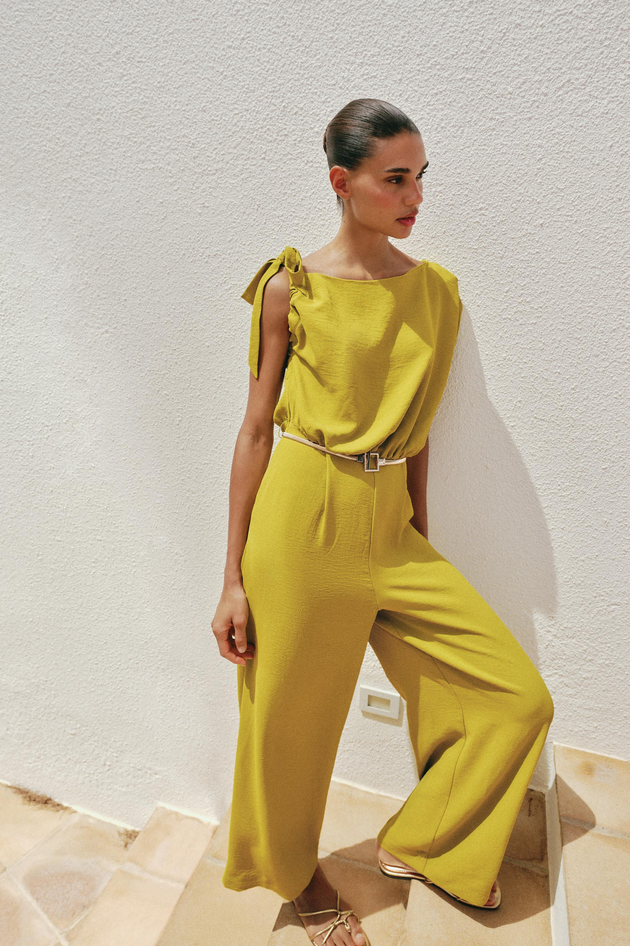 ASYMMETRIC SLEEVE BELTED JUMPSUIT | Zara US
