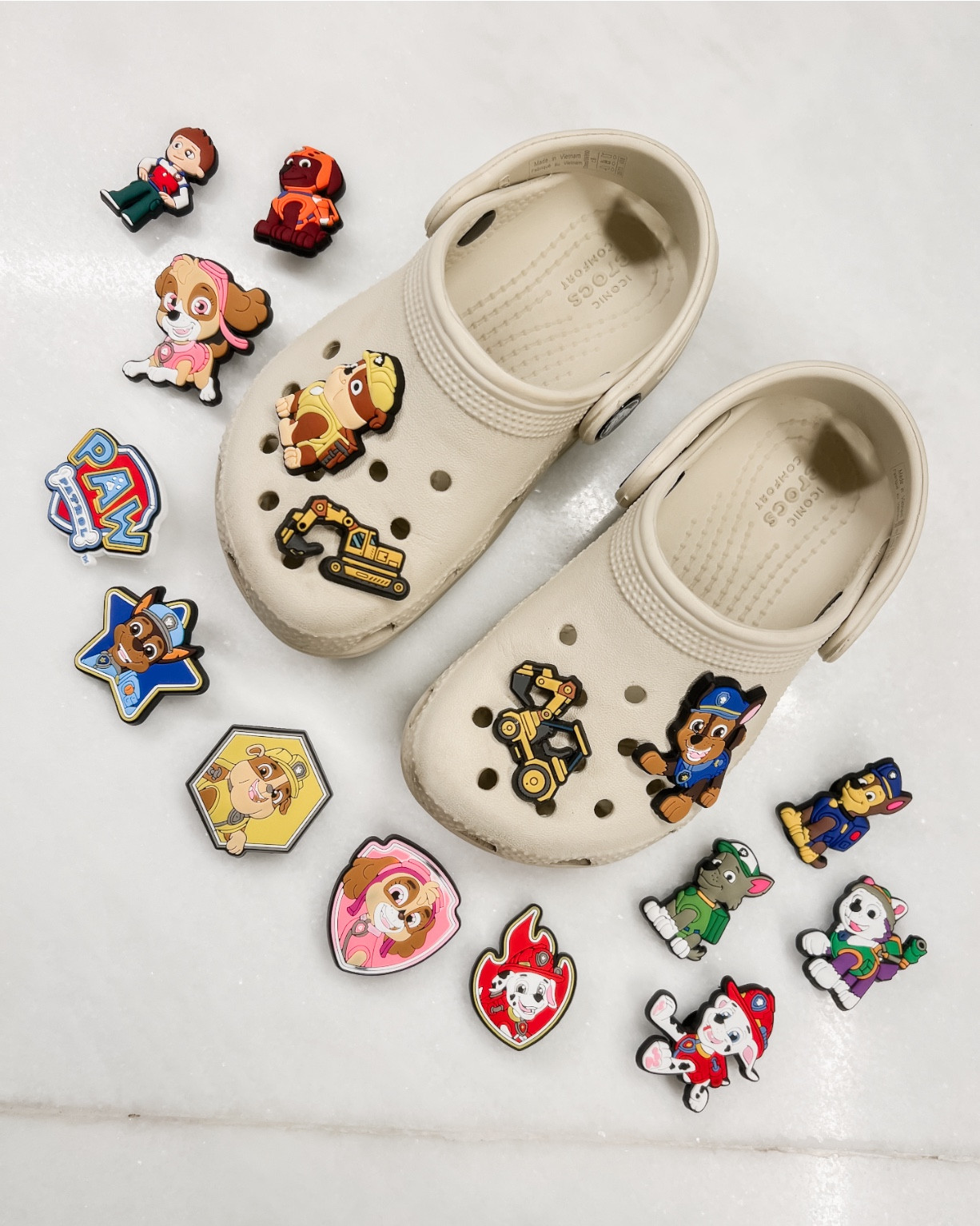Save vs Splurge! 

I found the cutest paw patrol croc charms on Amazon for $9 and comes with more options! Only difference is some of the color is a little different but I like the Amazon colors a little more!! 

Crocs jibbitz are $19! 

#LTKKids #LTKBaby #LTKFindsUnder50