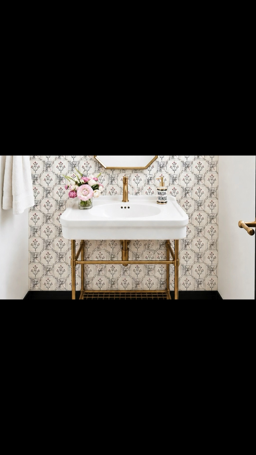 This powder room proves that a classic console sink can still feel fresh and modern. The warm brass finish adds just the right touch of luxury, while the clean lines keep the space feeling light, timeless, and sophisticated. A beautiful mirror, statement sconces, and thoughtfully layered details can make even the smallest room feel special.

#powderroom #consolesink #bathroomsink #bathroomfaucet #mirror #wallsconce #powderroomdesign #bathroomdesign #brasshardware #brassfaucet #luxurybathroom #classicmodern #timelessdesign #interiordesign #homedecor #getreadyspace #bathroominspiration #powderroomdecor

#LTKdayinmylife #LTKHome #LTKSaleAlert