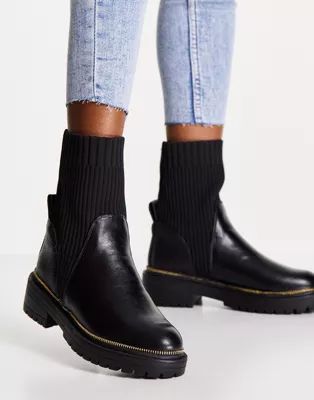 River Island chunky cleated sole heeled sock boot in black | ASOS (Global)