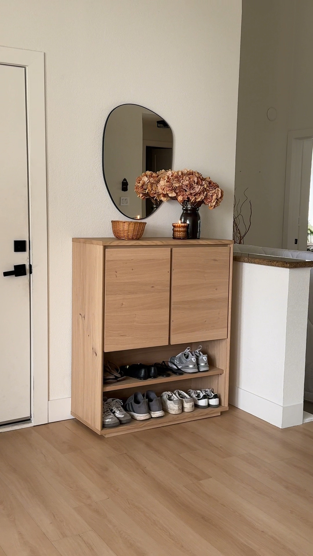 after a year we finally did something about this awkward entryway space!

I love that the shoes are easily accessible, while the rest of our stuff is stored away. 

i love its minimal and versatile style so i can have fun with decorating through all the seasons and styles i try too! 

#ShoeCabinet #ShoeOrganizer #EntrywayFurniture #Entryway #WestElm #LightwoodFurniture #EntryMakeover 

#LTKHome #LTKFamily