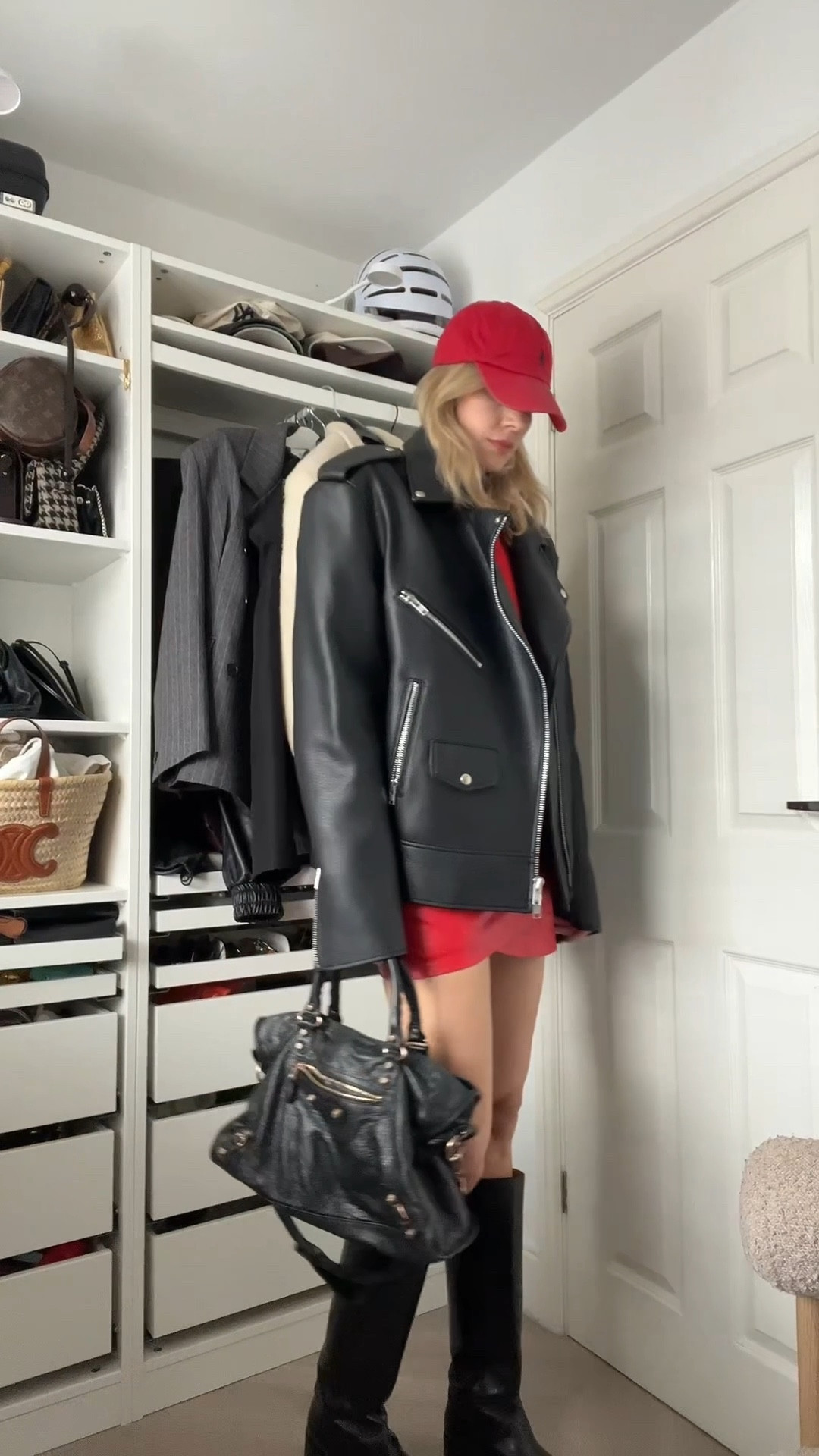 Oversized leather jacket, baseball cap, red skirt, red jumper, balenciaga bag 

#LTKstyletip #LTKspring #LTKeurope