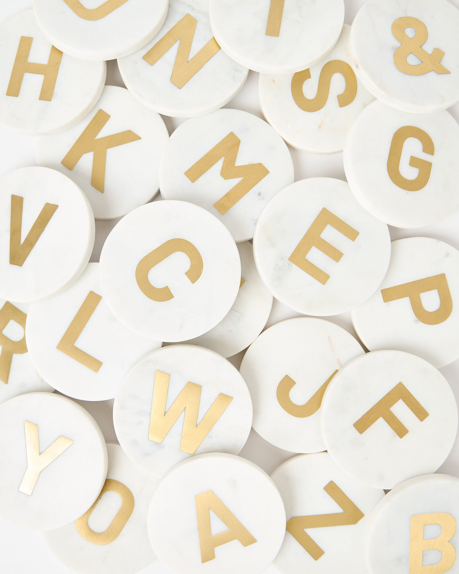 Fresca Alphabet White Marble & Brass Initial Coaster | Oliver Bonas | Oliver Bonas (Global)