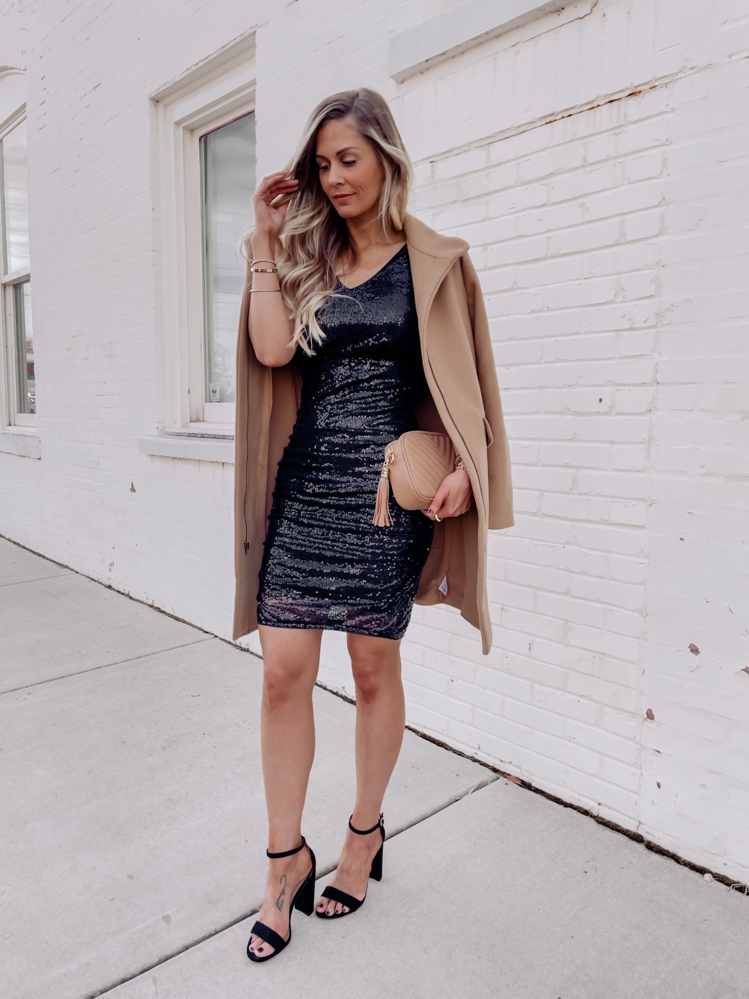 Nothing says HOLIDAYS like sequins and bows!! I LOVE this sequin dress!!! It fits true to size, and it’s pull on and very stretchy. It is so soft on the inside that you don’t even notice the sequins on the outside. Paired with these cute bow heels makes the perfect statement for any holiday new years party. 

Tags: holiday outfit - holiday fashion - black bow heels - dressy Christmas outfit - Christmas party outfit - Christmas party fashion - cute Christmas outfit - holiday skirt sequin mini skirt - oversized sweater - Christmas party dress - Christmas dress - holiday dress - sequin dress - dresses - sequin dresses - New Year’s Eve - NYE 

#LTKSeasonal #LTKHoliday #LTKGiftGuide