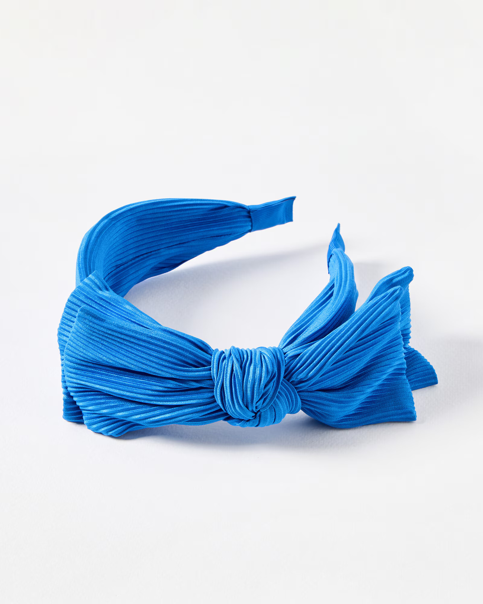 Astri Pleated Blue Statement Bow Headband | Oliver Bonas | Oliver Bonas (Global)