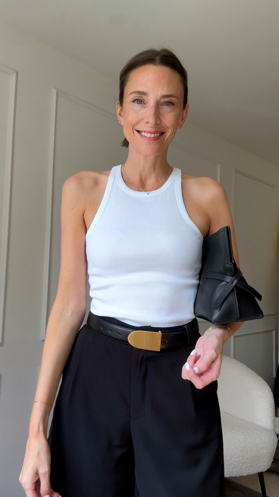 Black shorts, white top, black leather clutch bag, summer in the city, interesting belt, black leather belt

#LTKStyleTip #LTKSaleAlert #LTKItBag
