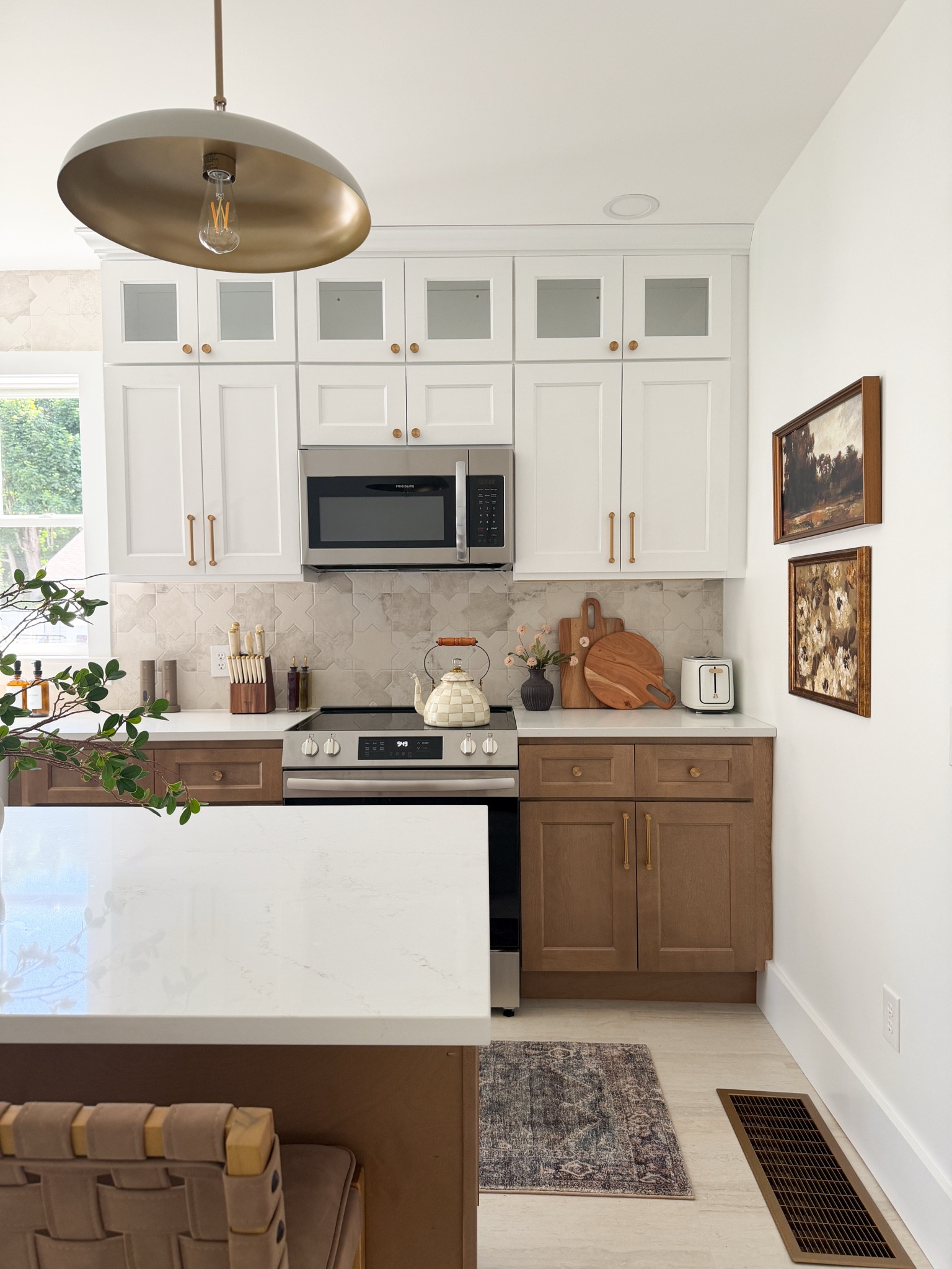 Our finished Airbnb kitchen! The cabinets are from RTA Cabinets — top is Weston White & bottom is Florence Honey. 

#kitchenmakeover
#Airbnb