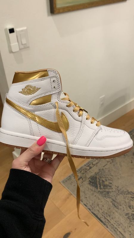 Gold and white Nike Air Jordan’s 
These come in women’s, Little Kids and Toddler sizes so my 9 year old and I are rocking the coolest mommy and me look!

#LTKshoecrush #LTKkids