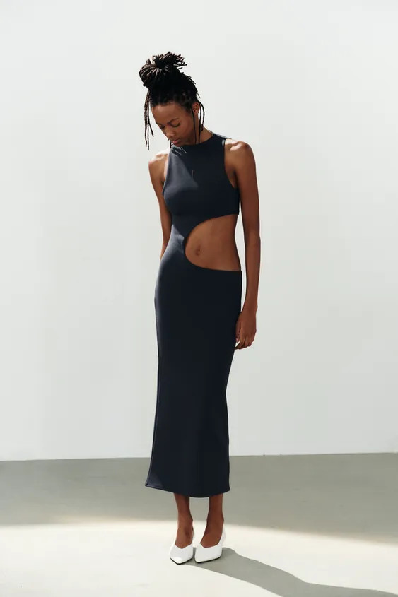 Dress made of stretch fabric. Straight neckline and sleeveless. Side slit detail. | Zara US
