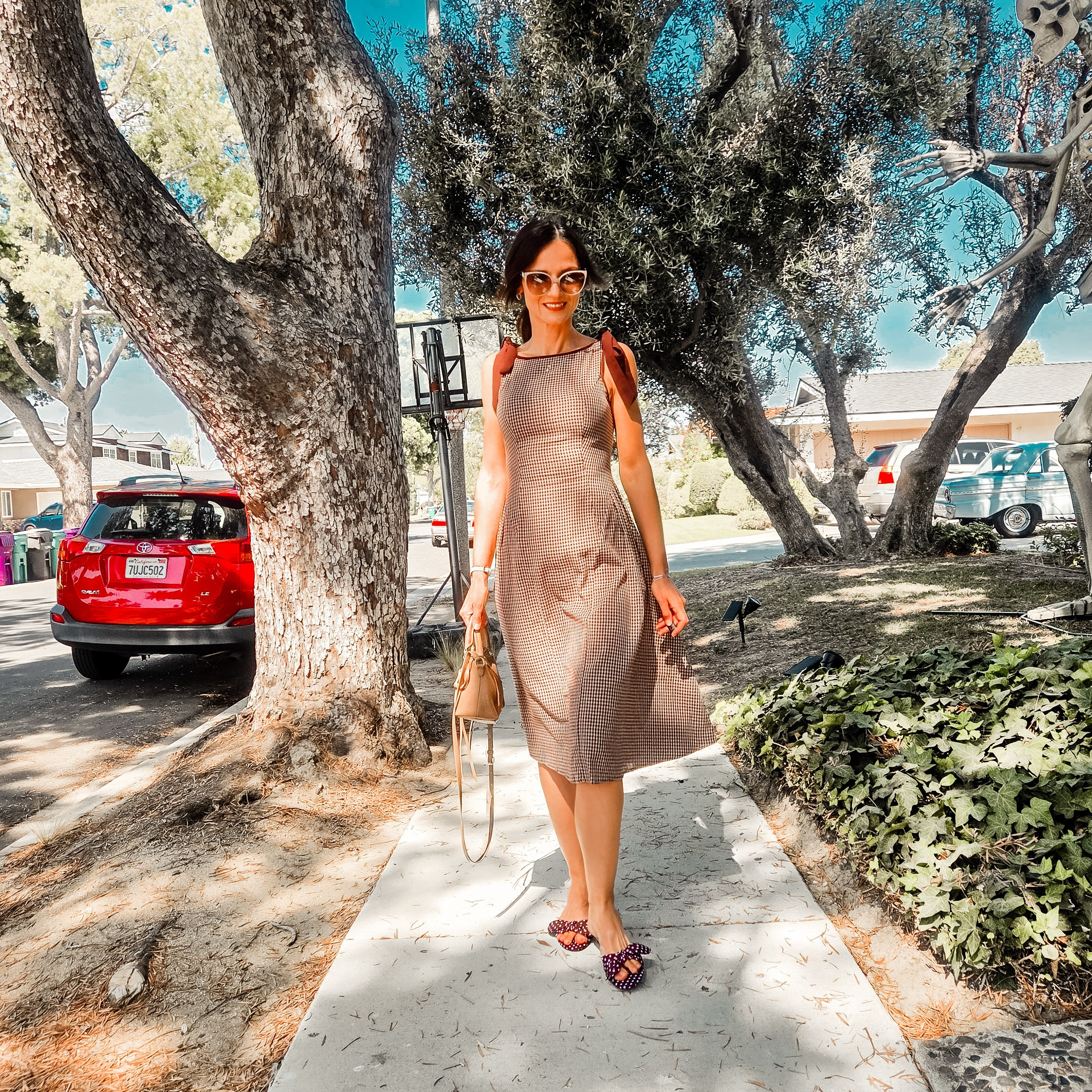 The most beautiful chocolate brown midi dress! The bow detail at the shoulder is so unique and it is 100% cotton!! Hurry in and grab yours! 

#LTKOver40 #LTKFindsUnder100 #LTKTall