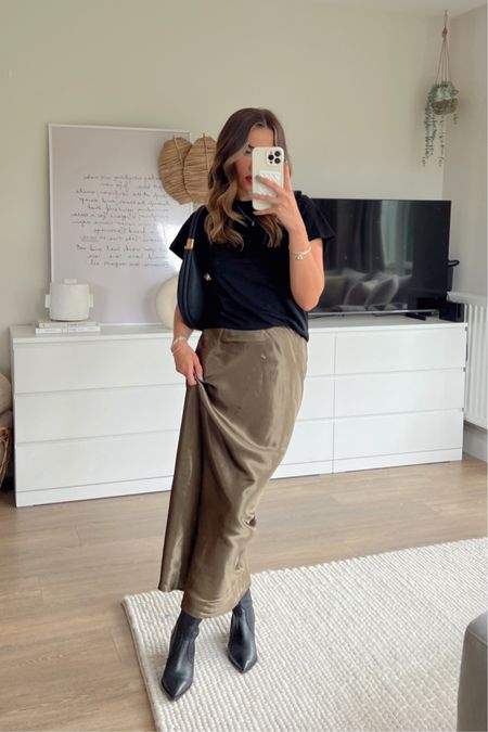 Styling a dark green satin maxi skirt with a classic boxy T-shirt from new look and western inspired point toe chelsea boots for a simple day to night outfit this autumn 

#LTKstyletip #LTKunder100 #LTKSeasonal