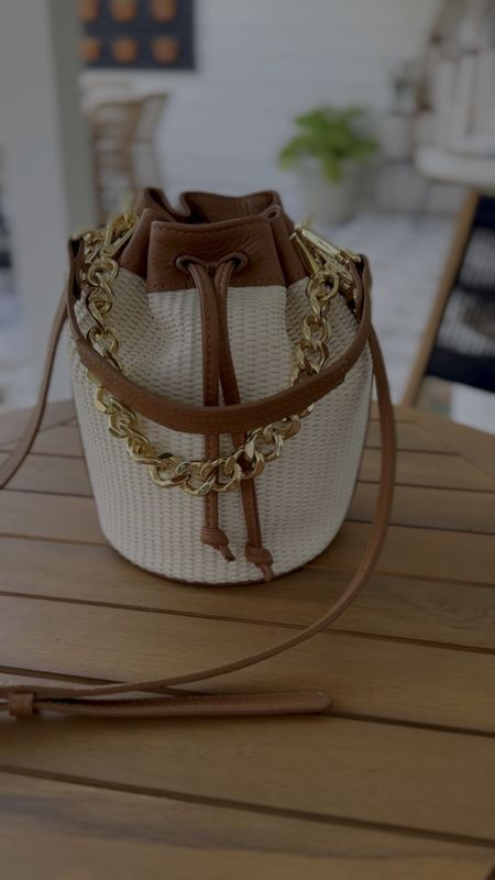 Summer bucket bag, drawstring leather bag, gold chain handle, crossbody, vacation outfit, summer outfit, Gigi New York 

#LTKVideo #LTKStyleTip #LTKItBag
