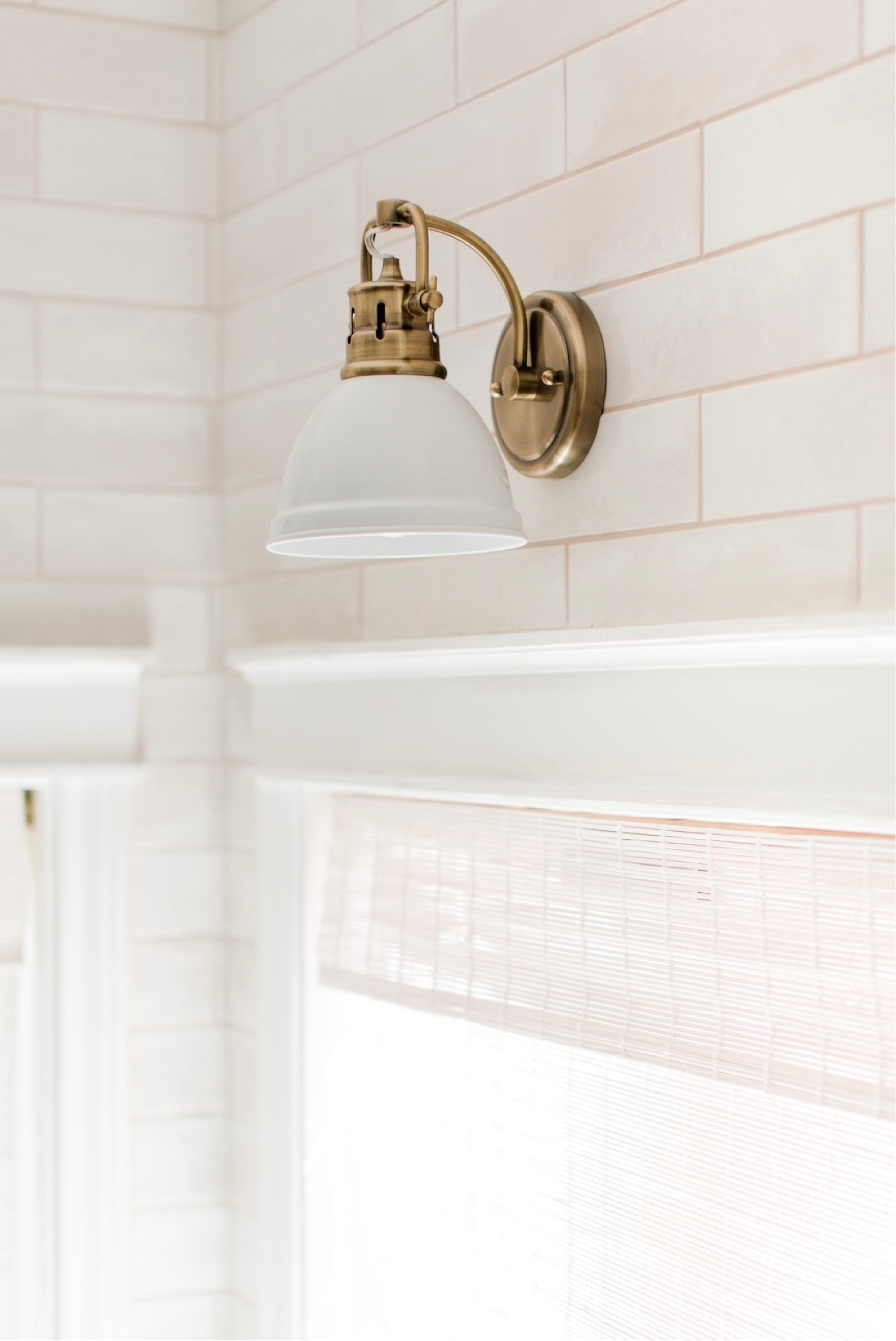Wall sconce for kitchen on Sale! // brass and white // backsplash tile // woven Roman shades // transitional kitchen // Wayfair 

#LTKhome #LTKsalealert