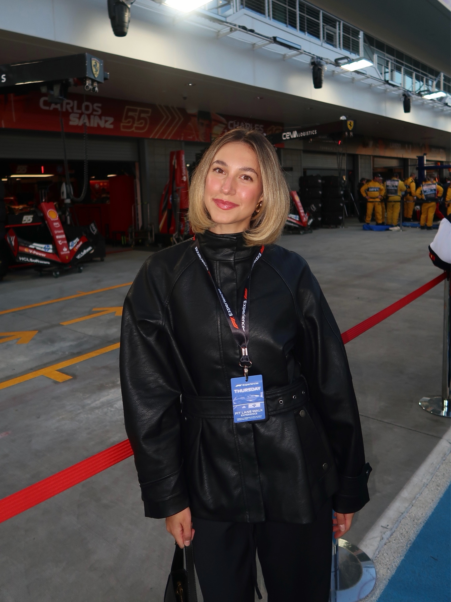 Formula one, formula 1, f1, race outfit, race style, Grand Prix outfit, leather jacket, belted leather jacket, black pants, black trousers, black knee high boots