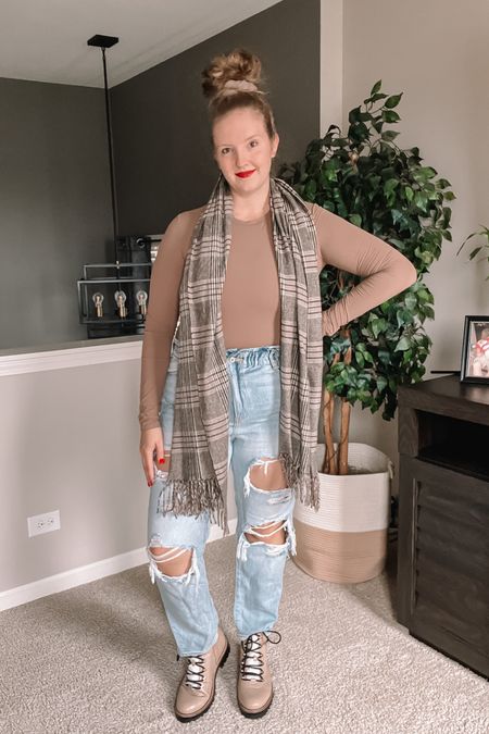 Spring has sprung! Wear long sleeves, layers and jeans out without the bulky coats for a spring outfit. Style a buttery soft bodysuit with a subtle neutral plaid scarf for a layered look. Paper bag jeans and neutral boots polish off the look.

#LTKSeasonal #LTKshoecrush #LTKmidsize