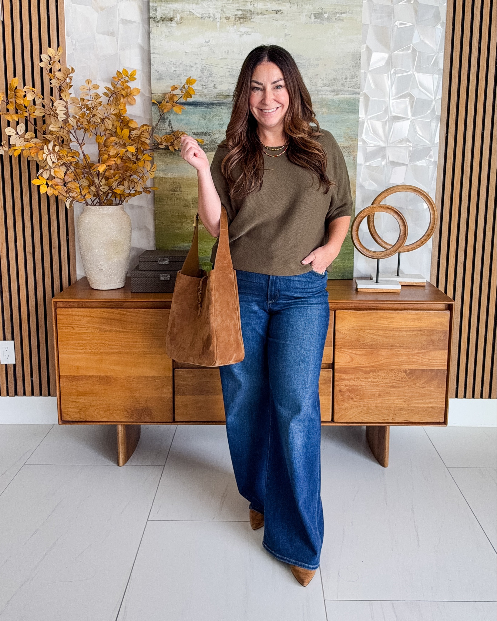 This is one of those easy fall outfits I’ll wear on repeat 🍂🤎 A simple sweater, great wide-leg jeans and warm suede accessories make it feel pulled together without overthinking it. Wearing Sweater tts, L | Jeans tts, 31 

 #LTKSeasonal #LTKOver40 #LTKMidsize