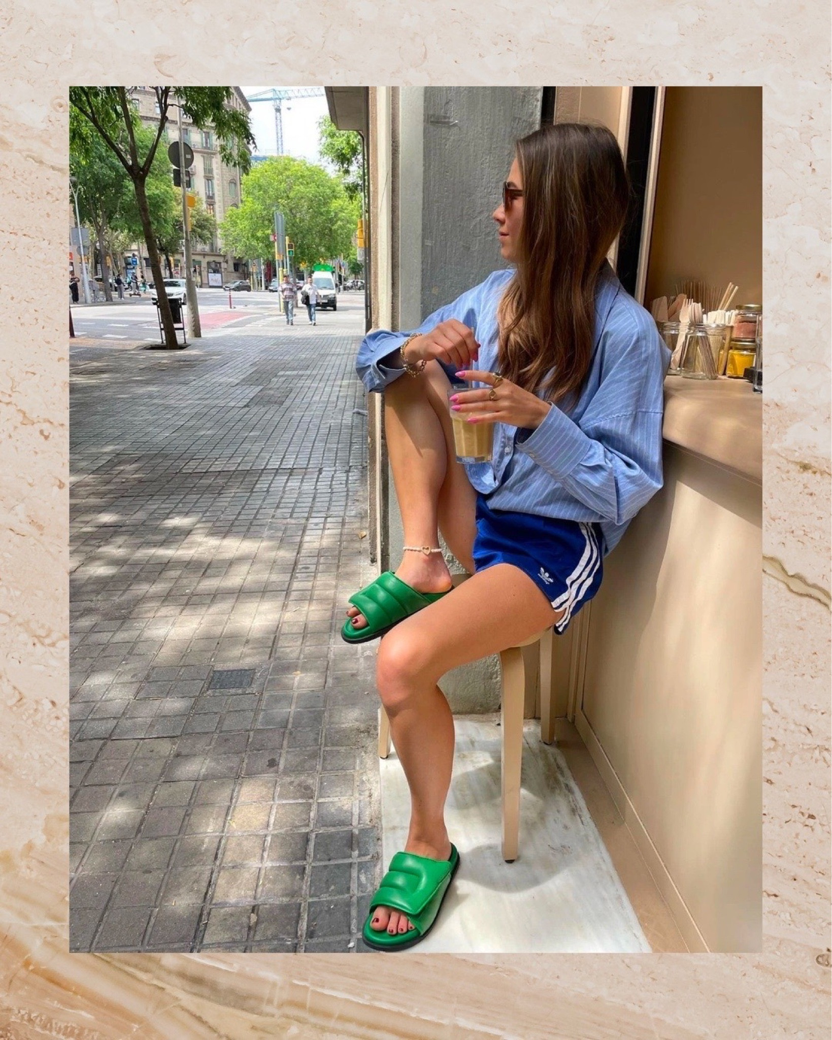 Elevate Your Athleisure With A Button Up Shirt - Get ready for the ultimate style fusion! This influencer effortlessly combines the laid-back athleisure trend with a touch of sophistication. Sporting soccer shorts and comfy puffy slides, she adds a surprising twist by pairing them with a chic striped button up shirt.

#LTKstyletip #LTKFind #LTKSeasonal