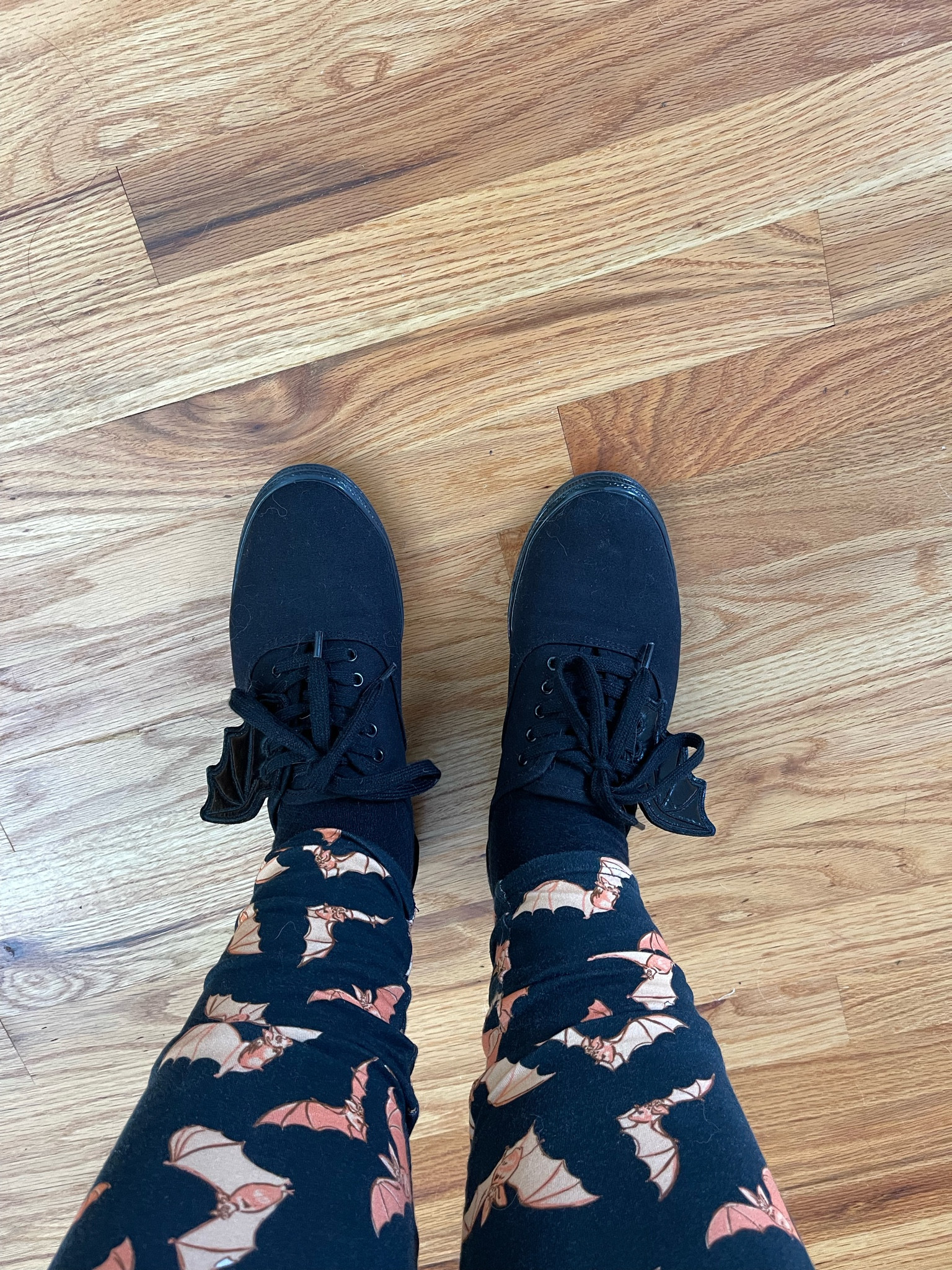 In love with these attachable bat wings for sneakers. 🥹 
Muse my code LYNZIJUDISH for 20% off the leggings. 

Halloween style, Halloween fashion, size 16 influencer, curves, plus size fashion, plus size style, bat leggings, bat wings, black tennis shoes 

#LTKunder50 #LTKcurves #LTKHalloween