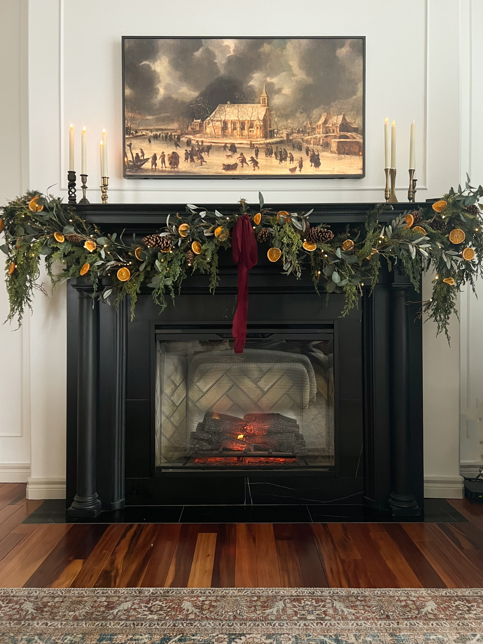 Christmas mantle using layered greenery! 

#LTKHoliday