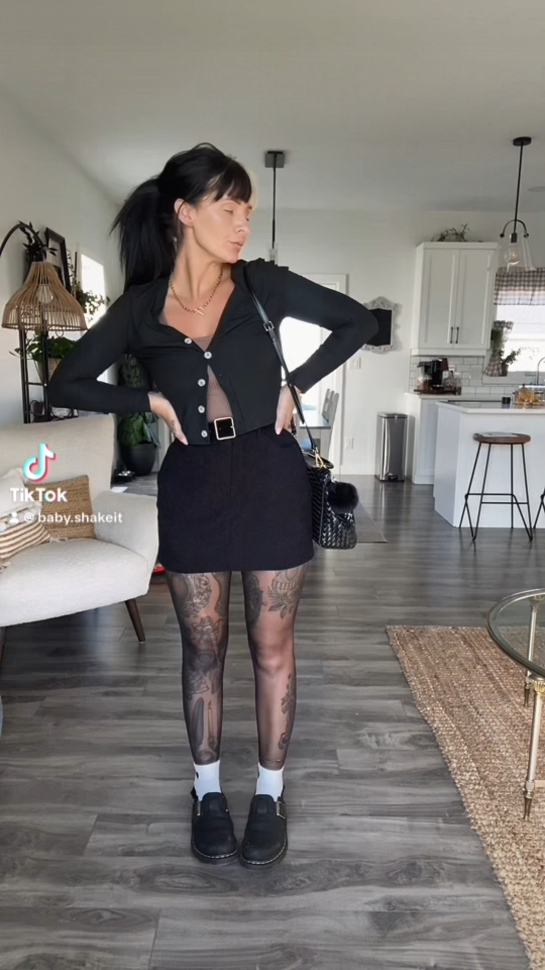 Sweater: Part of a shein 2 piece
Skirt: Amazon 
Tights: Dollarama
Shoes:Doc Marten Jorge II faux fur mules (I have tagged the suede ones as I cannot find the faux fur)
Belt: Amazon
Purse: JW PEI “Lucia"

#LTKfall #LTKwinter #LTKcanada