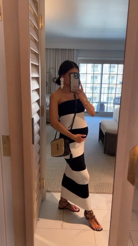 Resort wear / vacation outfit ideas
Shopbop black and white striped dress wearing a small
Valentino rockstud sandals run TTS
White floral statement earrings
Prada raffia bag
Maternity outfit

#LTKTravel #LTKFindsUnder100 #LTKStyleTip