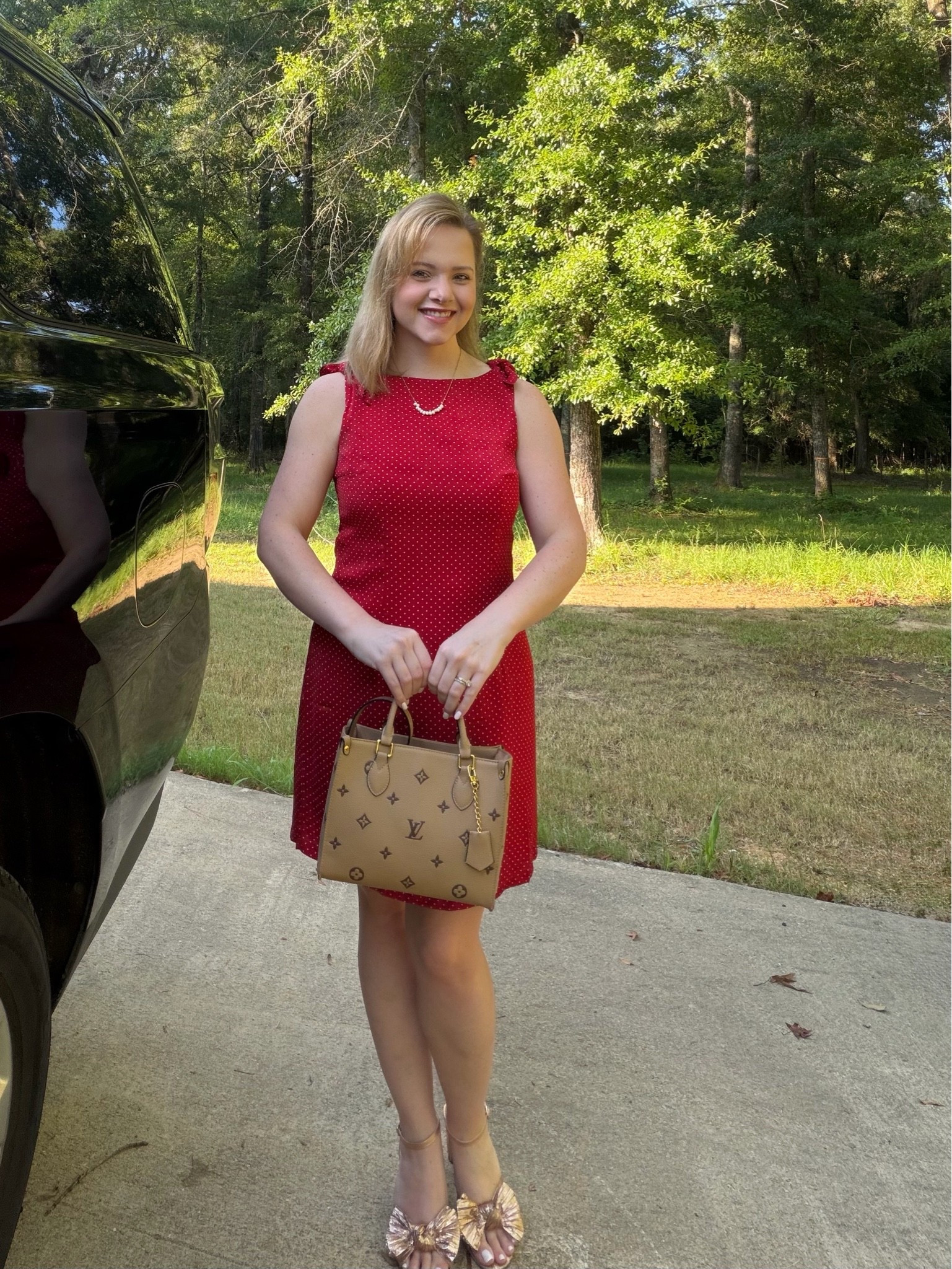 Micro polka dots, bow shoulders, and a bold red. It’s like it was designed just for me!

#LTKvlog