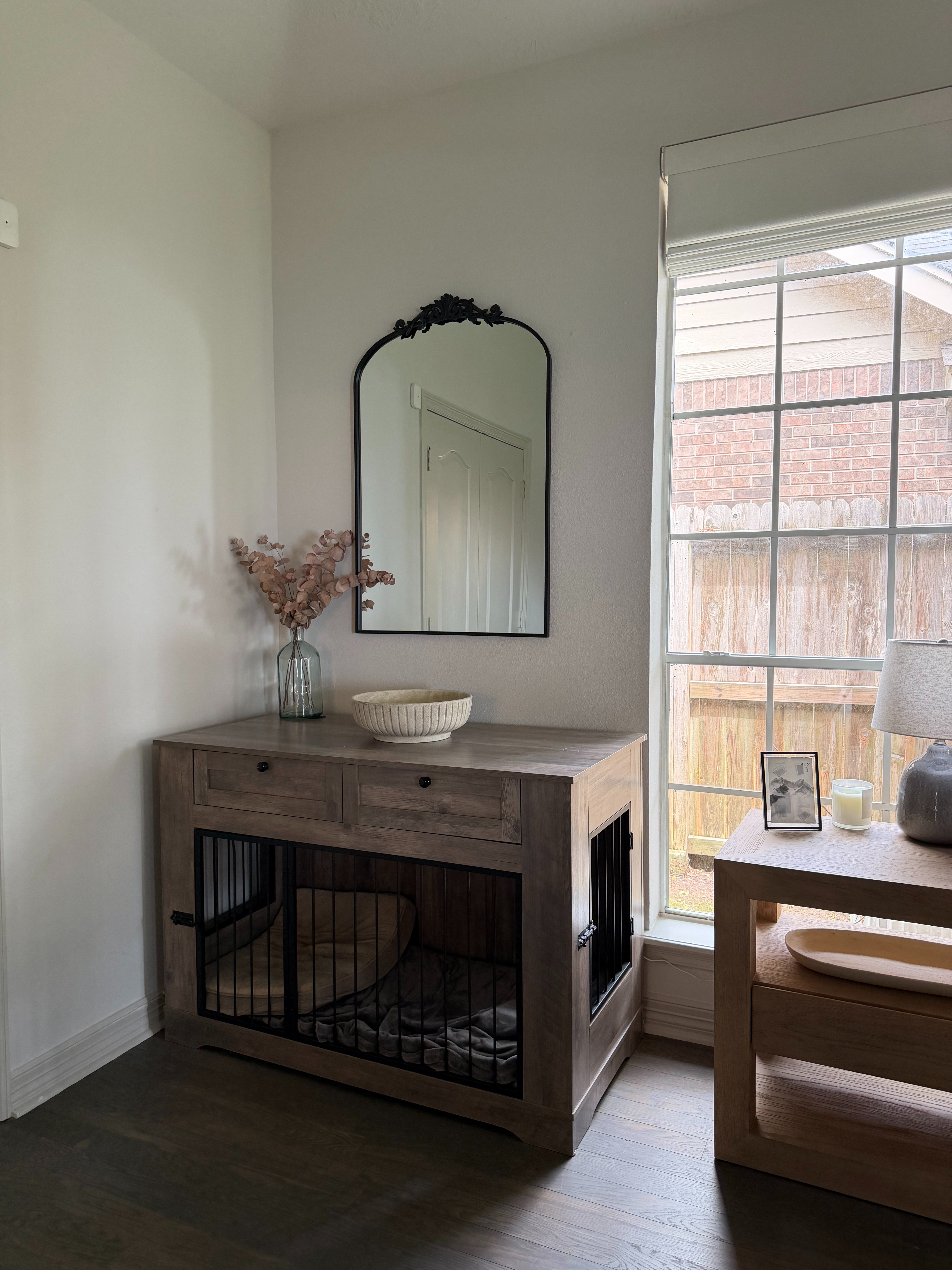 Our wooden dog kennel that matches our home decor! Has two drawers too for storage! 

 #LTKHome