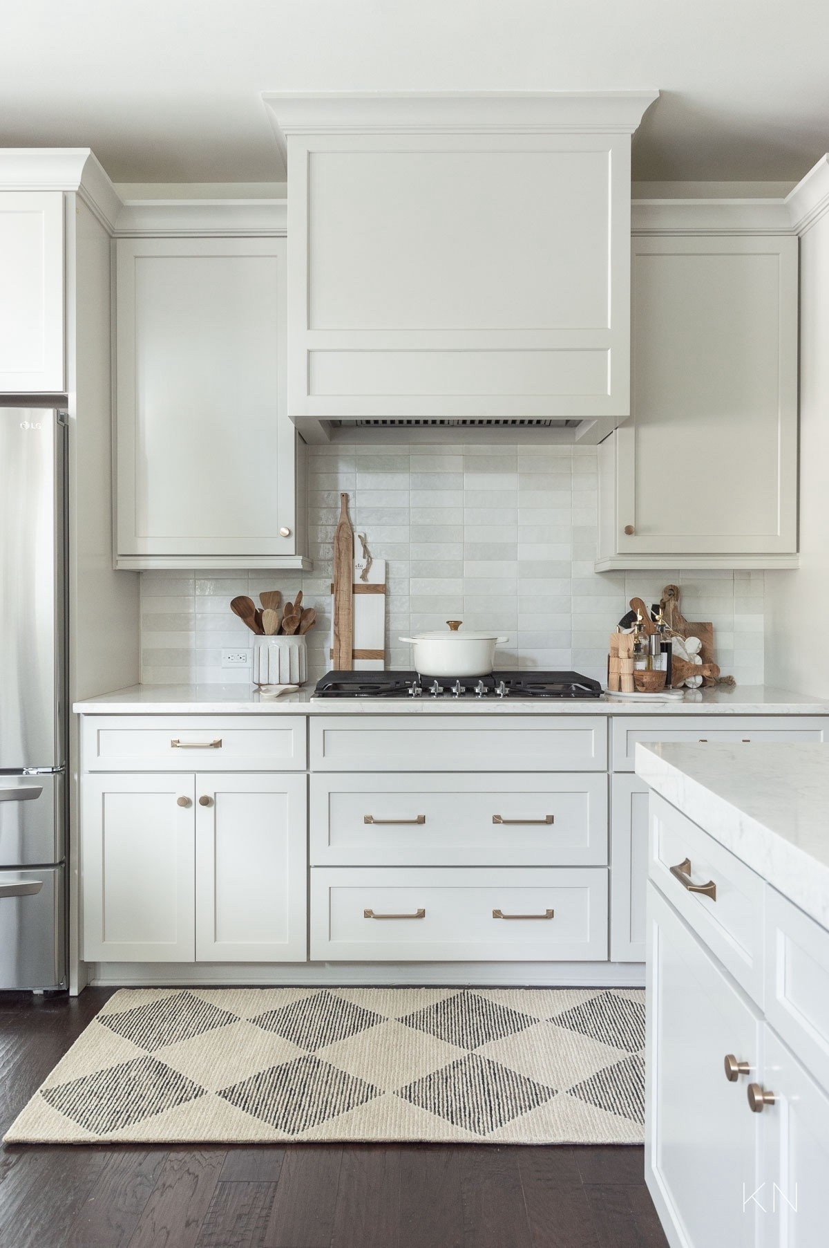 An easy and affordable way to refresh your kitchen is to add a new runner to the space. I love the pattern on this neutral rug and the price can’t be beat. home decor kitchen decor white tile backsplash agreeable gray cabinets champagne bronze cabinet hardware

#LTKHome #LTKSaleAlert