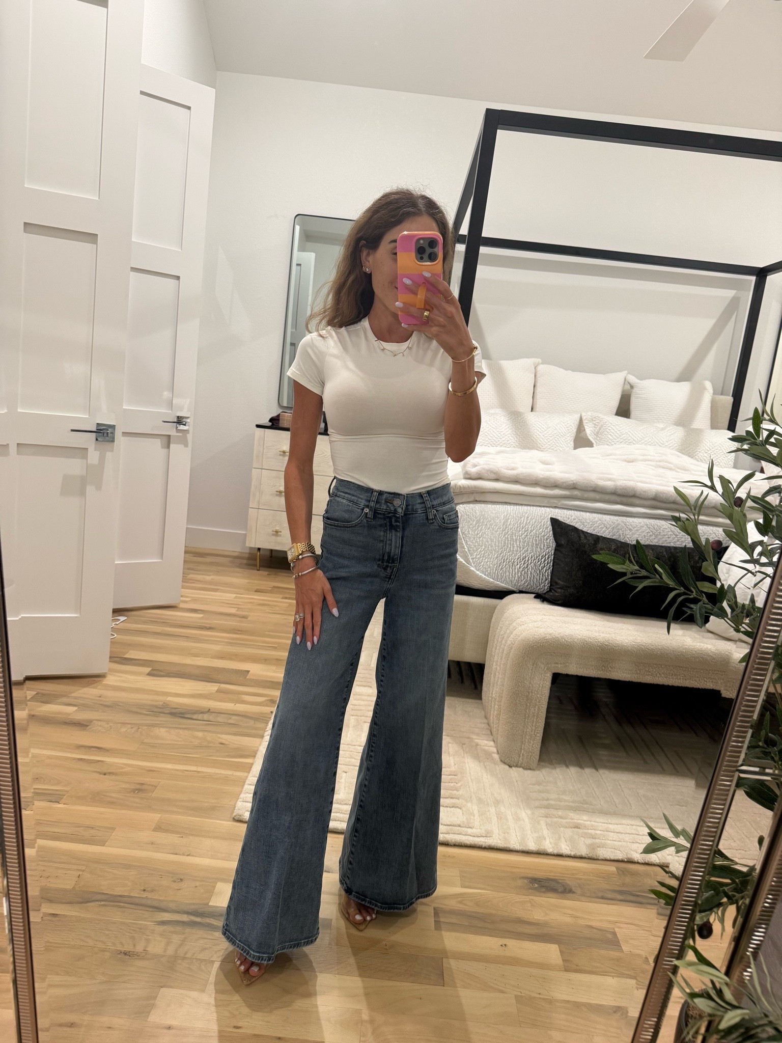 The perfect white tee wearing smallest size  wide leg jeans in smallest size