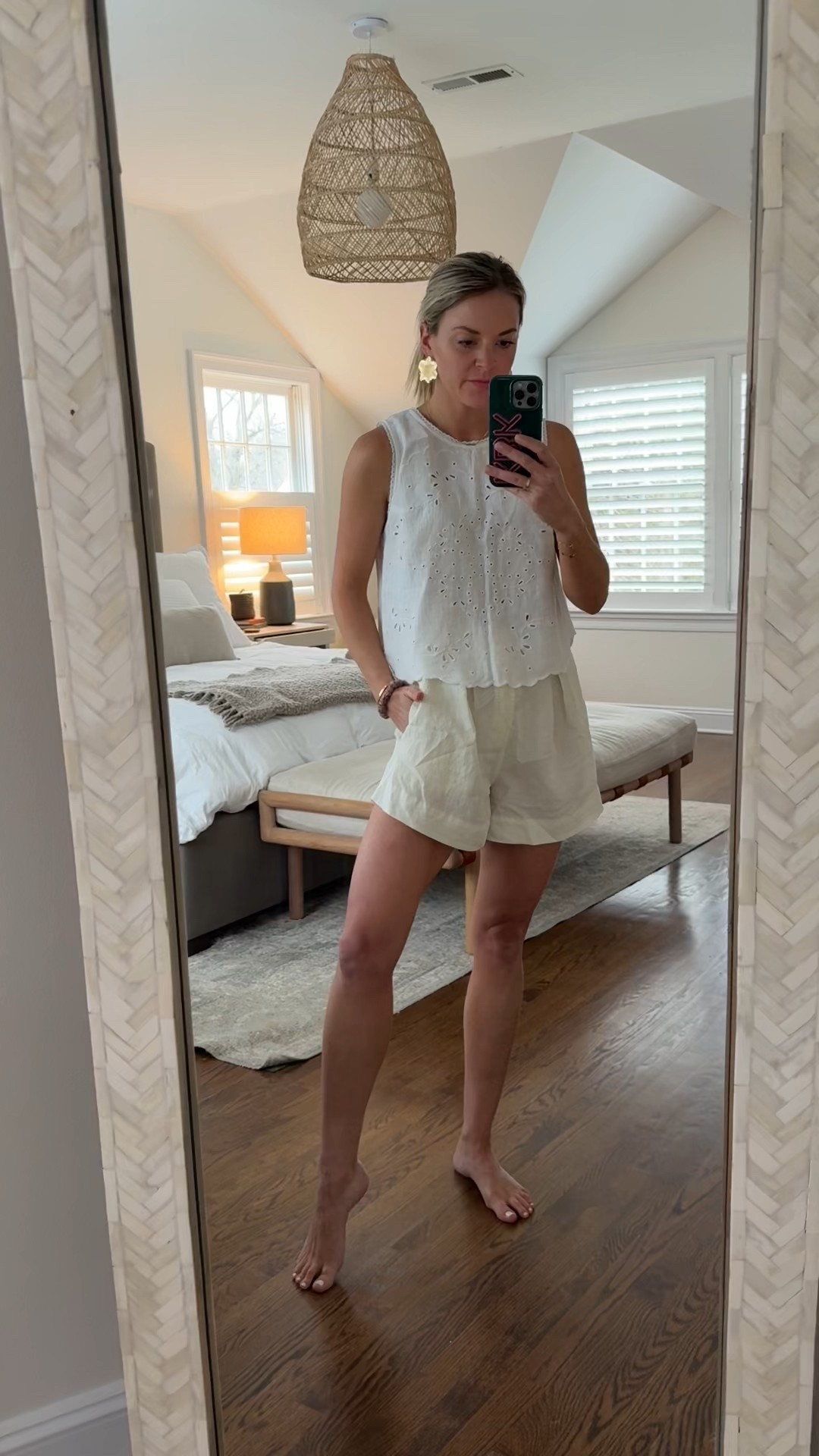 Eyelet tank perfect for warm weather vacation. Wearing a small and has a fun back detail! Size small shorts  

#LTKFindsUnder100