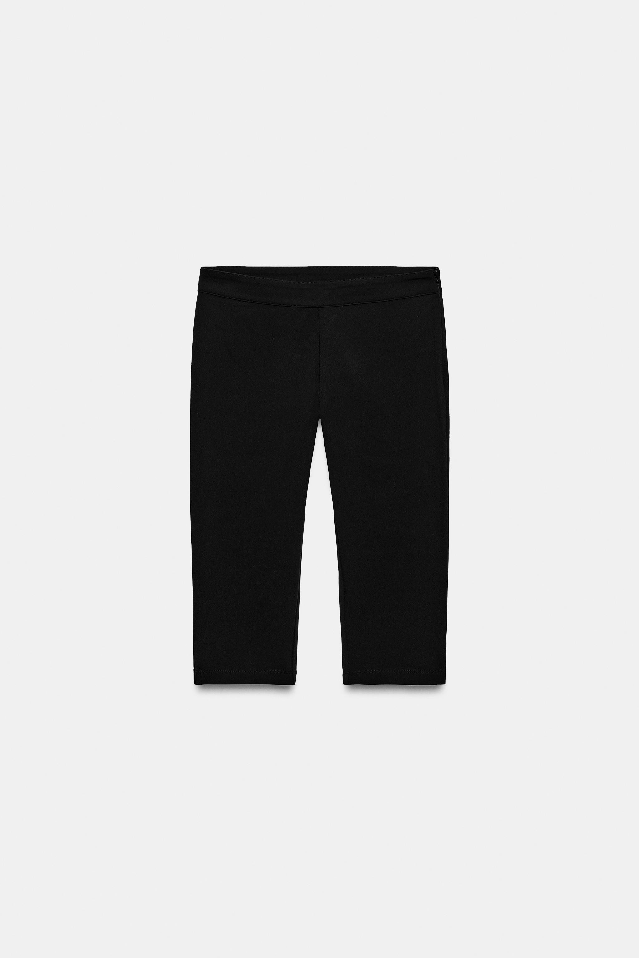 Model height: 178 cmCapri trousers made of stretch fabric. Mid-waist. Side zip fastening. | Zara UK